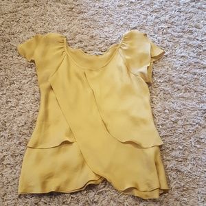 Sleeveless blouse mustard